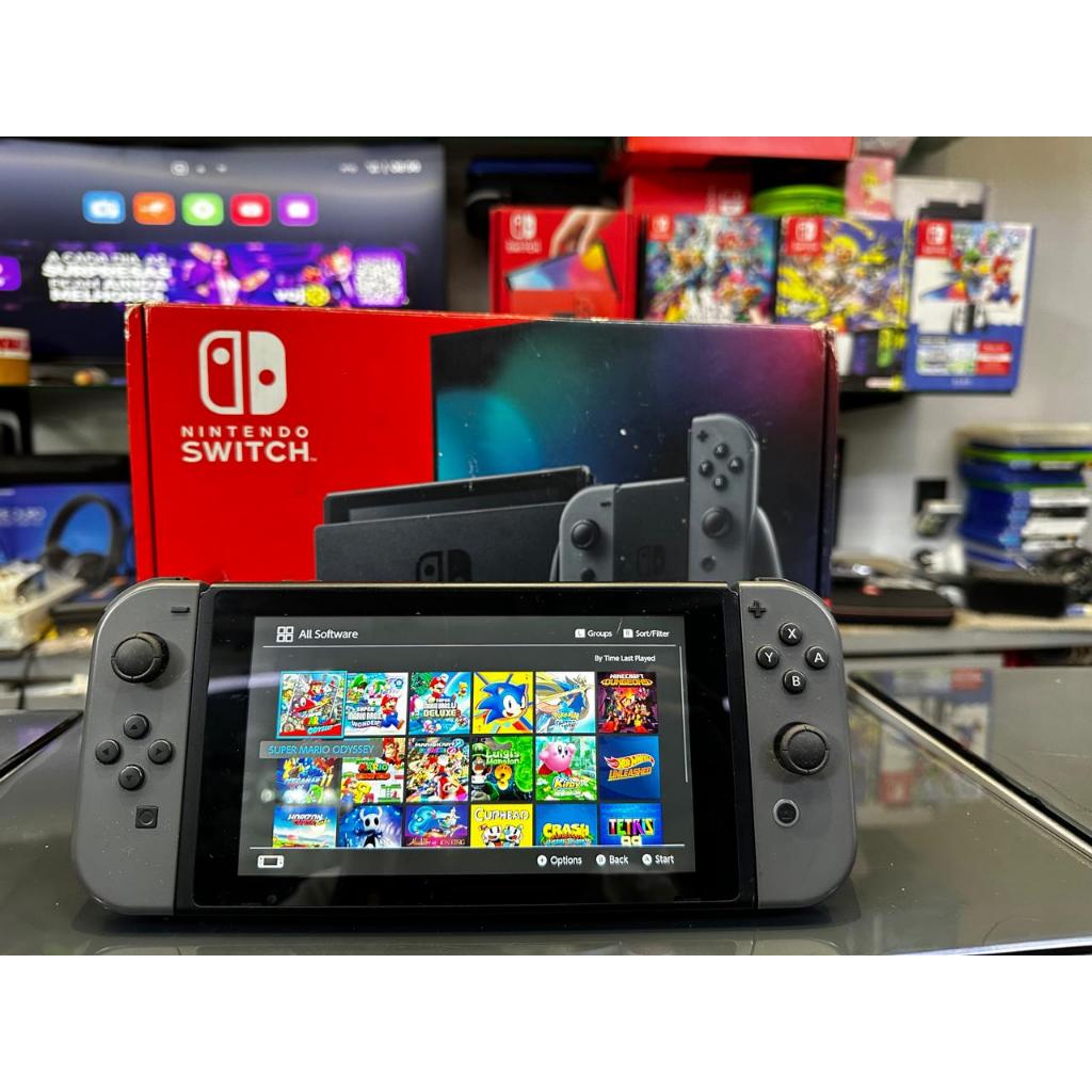 Nintendo Switch V2 Desbloq + Cartão MicroSD 128gb Semi-Novo
