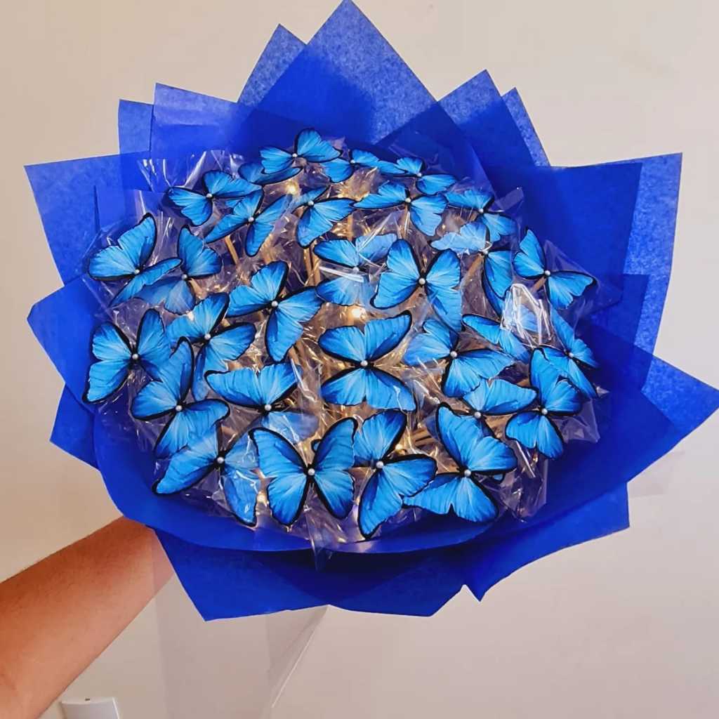 Buque de borboletas azul escuro com led. Buque de borboletas ...
