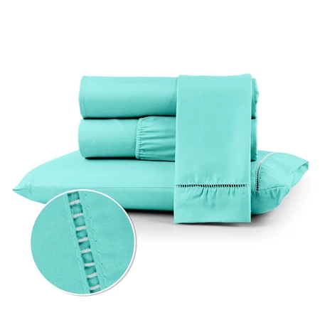 Conjunto de lençóis sobre uma cama