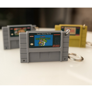 Chaveiro Cartucho Super Nintendo 3D–Escolha Seu Jogo Favorito! Super Mario World, Zelda, Donkey Kong em Oferta na Shopee