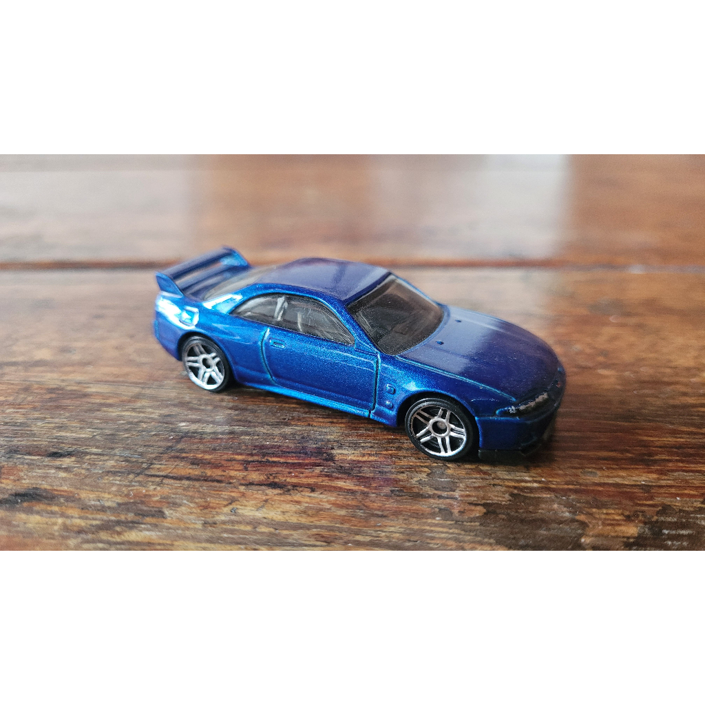 Hot Wheels - Nissan Skyline GT-R R33 Azul - Then and Now 2018 (Fora da  Embalagem) - Main Line 1:64