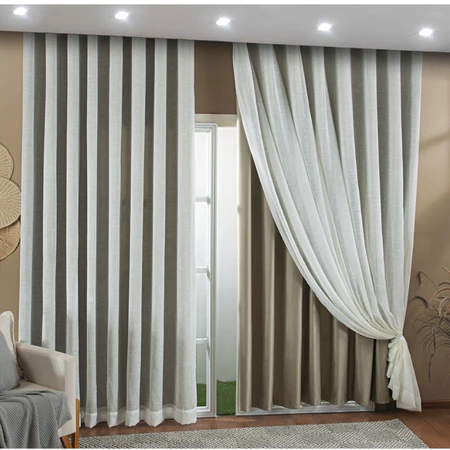 Cortina de linho com forro em microfibra com detalhe de amarração lateral em ambiente decorado