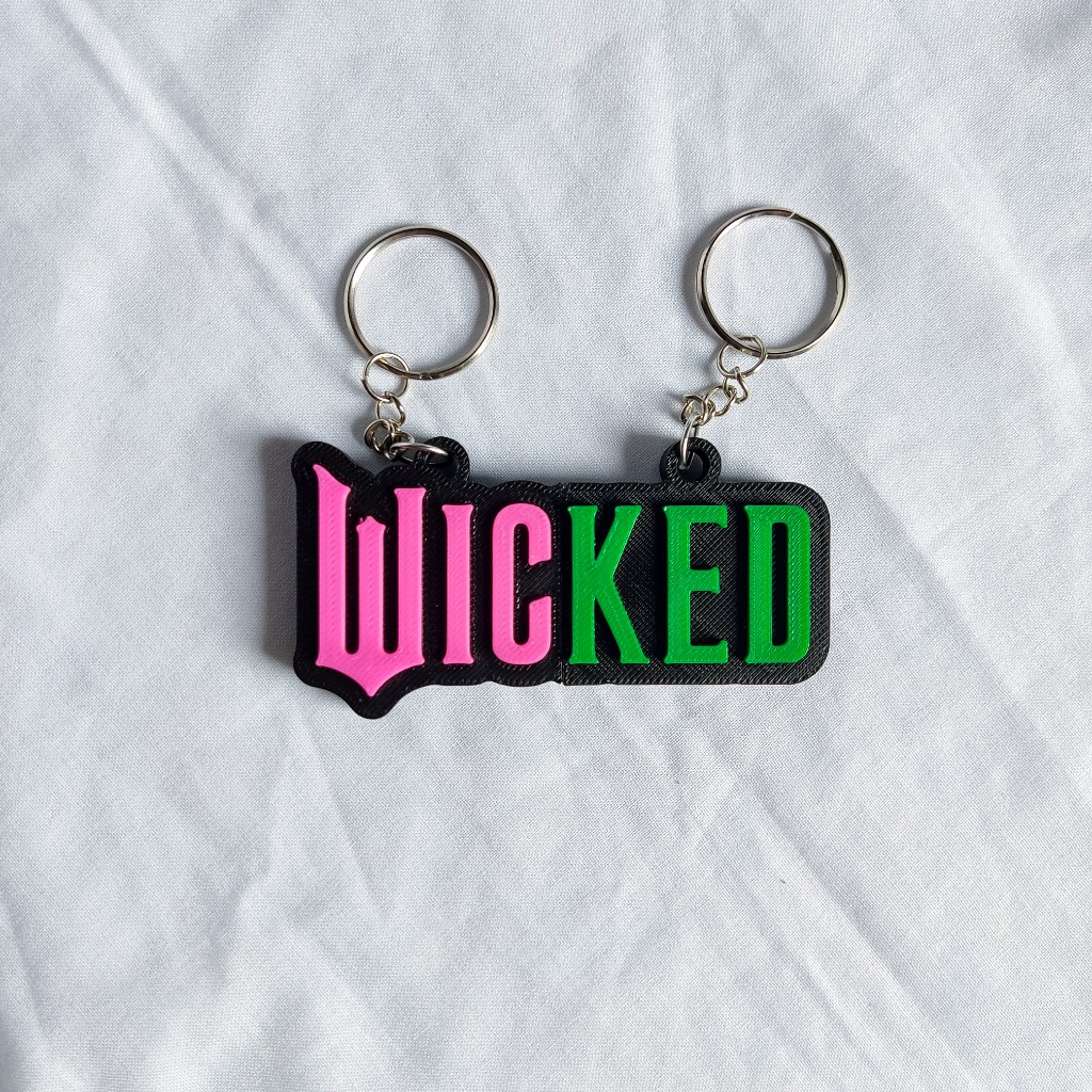 Chaveiro Wicked - Glinda - Elphaba - Ariana Grande - *LEIA A