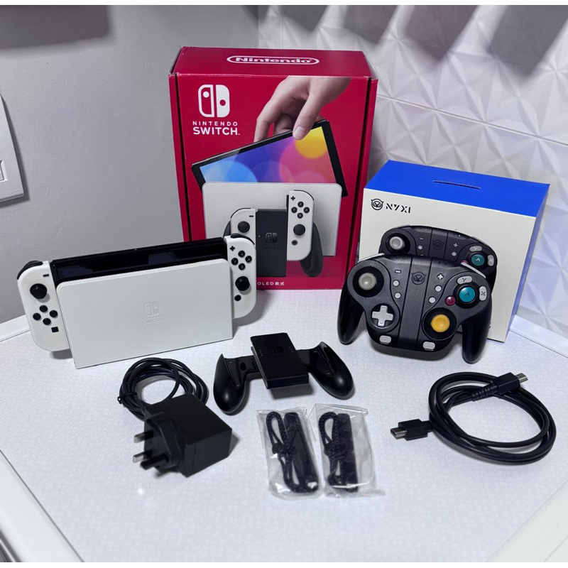Nintendo Switch Oled branco + brinde controle | Shopee Brasil