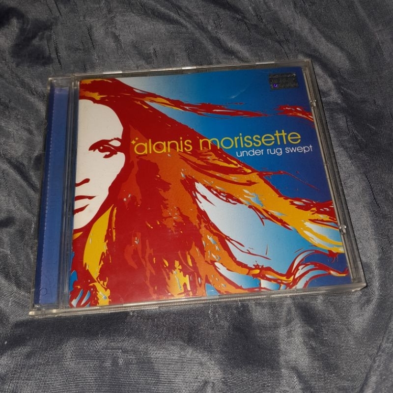 cd Alanis morissette - Under rug swept | Shopee Brasil
