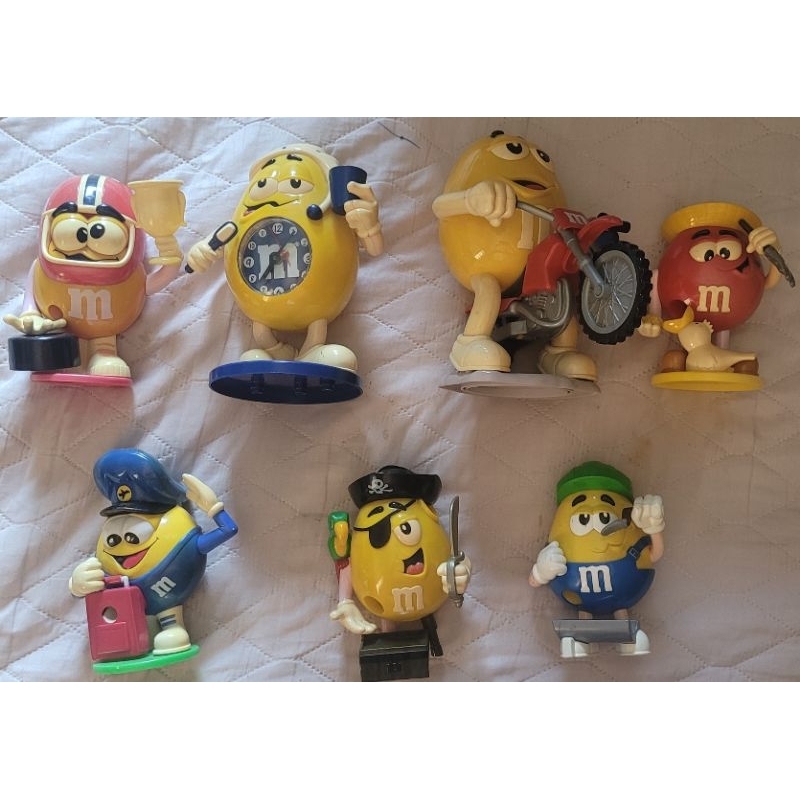 lote 7 bonecos dispenser M&MS miniatura porta mms pote bombom mems