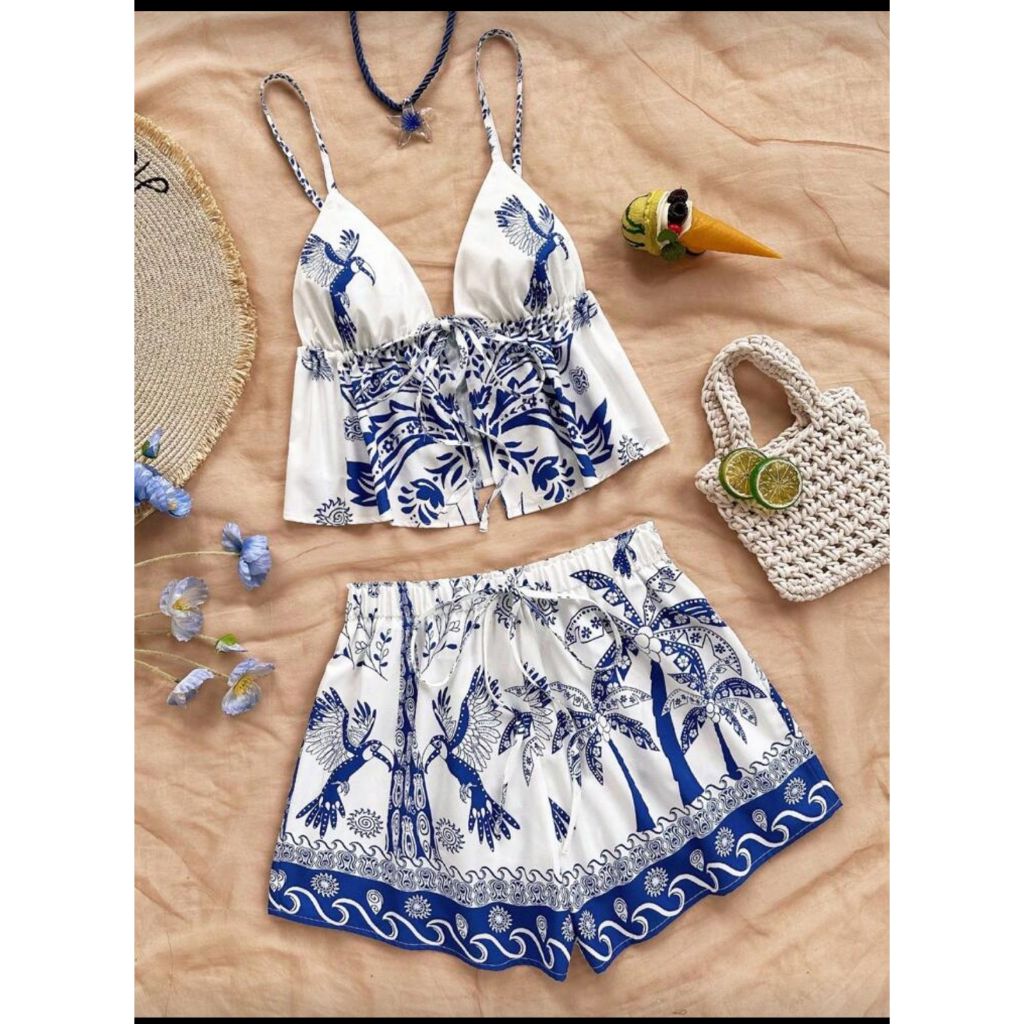 Conjunto feminino Mila Blusa Assimétrica Manga Comprida e Calça Pantalona em Malha Ribana Canelada