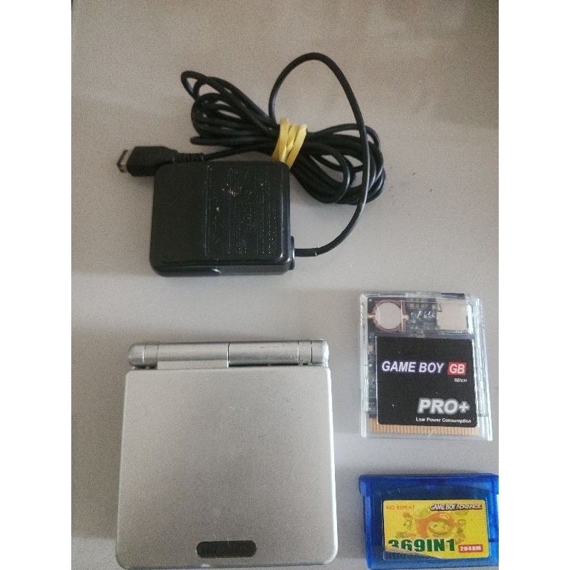 leia o anúncio por gentileza Game Boy Advanced SP console com marcas de ...