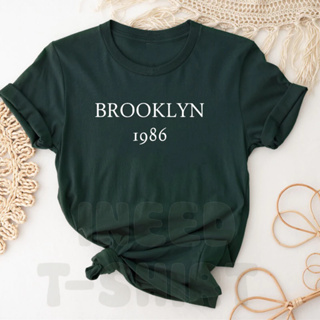 Camiseta Feminina Baby Look Bege Brooklyn 1986 em Promoção na Shopee Brasil  2024