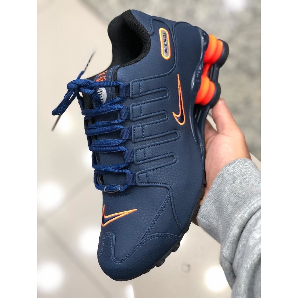 Nike shox nz hot sale azul e laranja