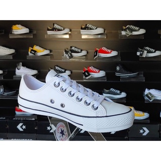 All star couro 2024 branco costura preta