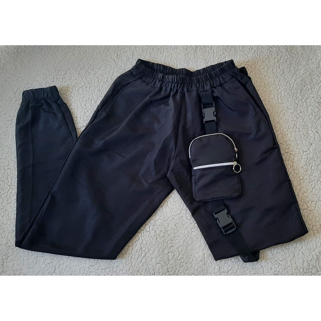 Calça tactel best sale com bolso lateral