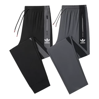 Calça esportiva de cor correspondente Homens de tamanho grande Solto de secagem rápida Protetor solar respirável Calça Casual de perna reta / Calça de pé gordo