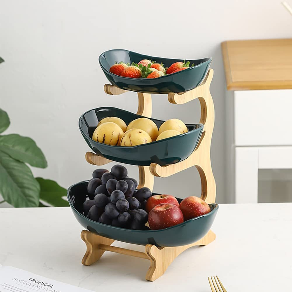 Green three tier fruit basket with bamboo stand