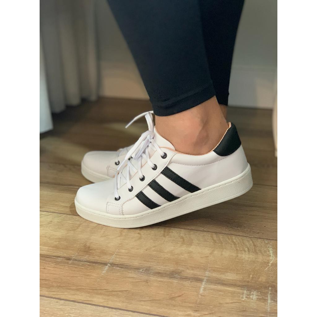 Adidas branco 2024 listra preta