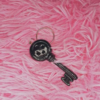 Chaveiro chave do filme Coraline e o mundo secreto envernizado