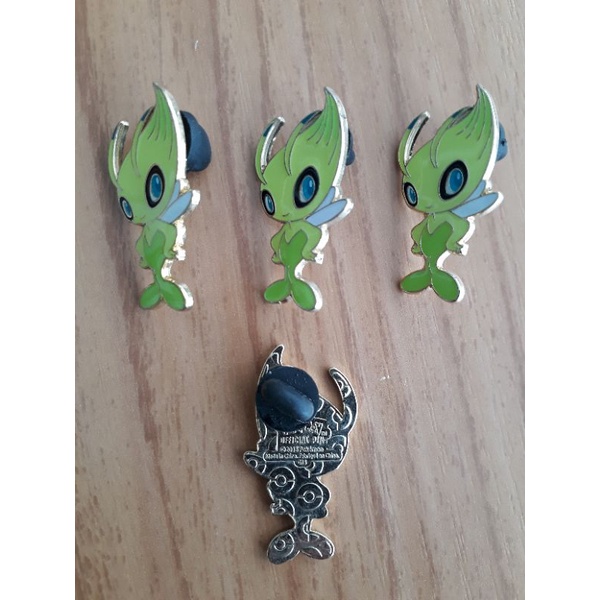 Pin original Pokémon Celebi | Shopee Brasil