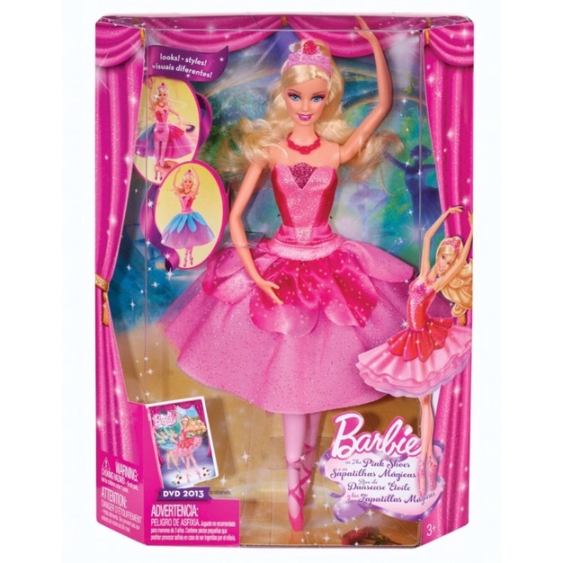 Boneca barbie vestindo roupas de cor rosa ou roxa
