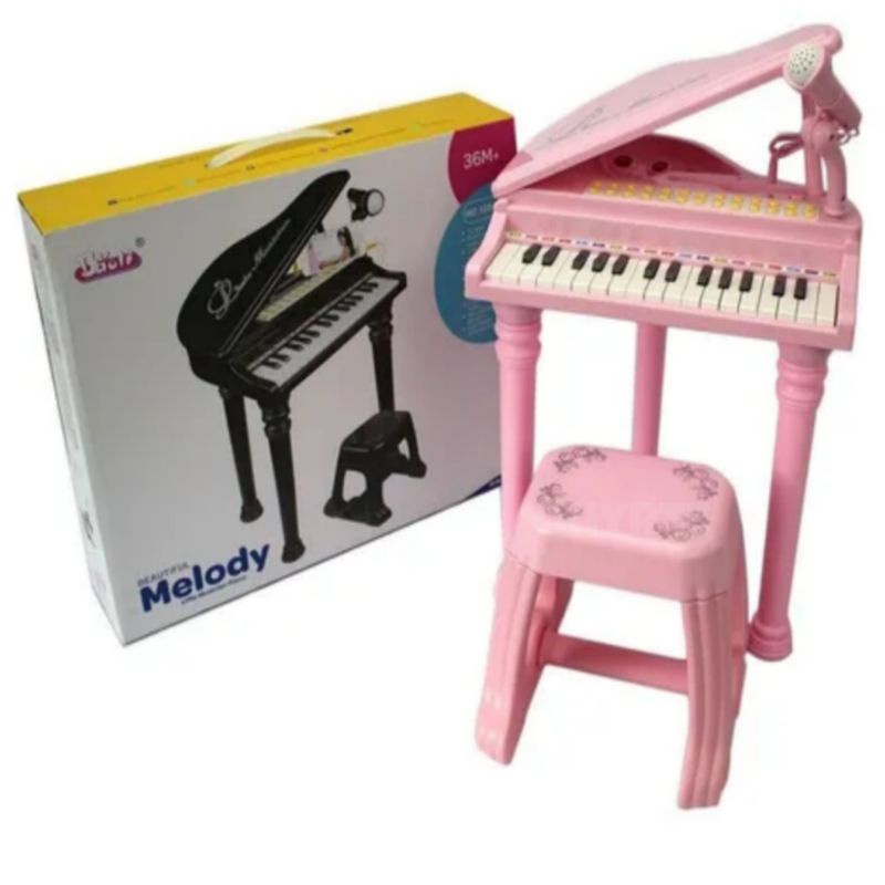 Lote 2 - SCHOENHUT, PIANO INFANTIL COM BANCO - Piano de brincar em madeira  com decoração lisa a castanho. Banco em madeira com assento em forma de  maça, cor-de-rosa. Dim: 50x43x26 cm (