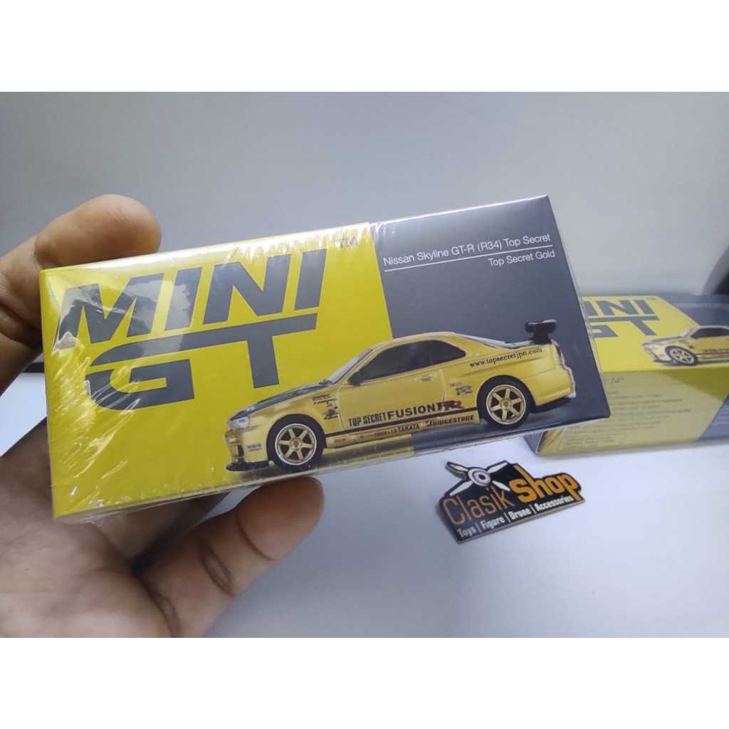 Mini GT Nissan Skyline GTR R34 Top Secret Gold Japão Exclusivo
