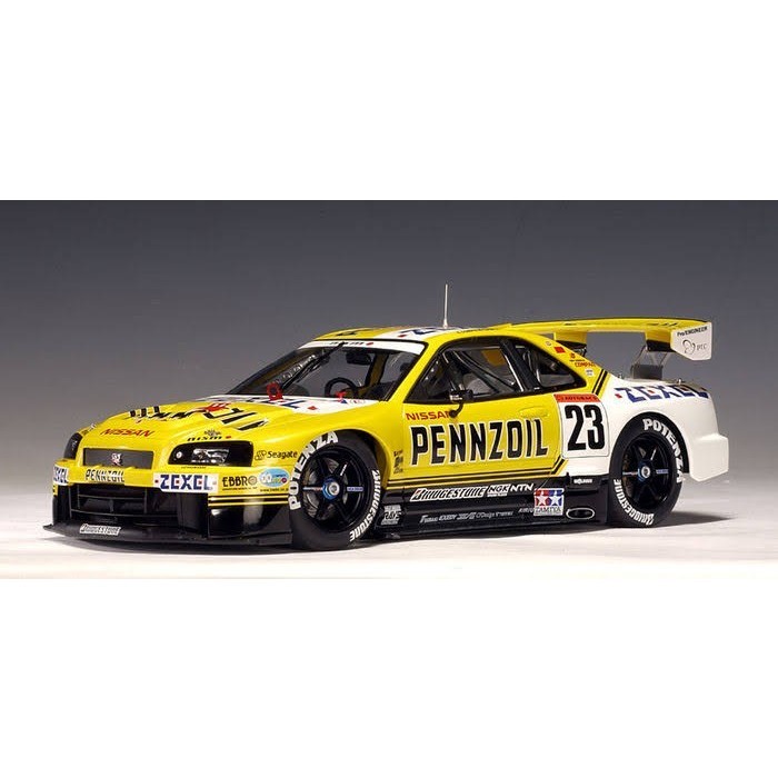 Diecast Autoart 1 : 18 Skyline R34 Nismo Fotocromático Pennzoil