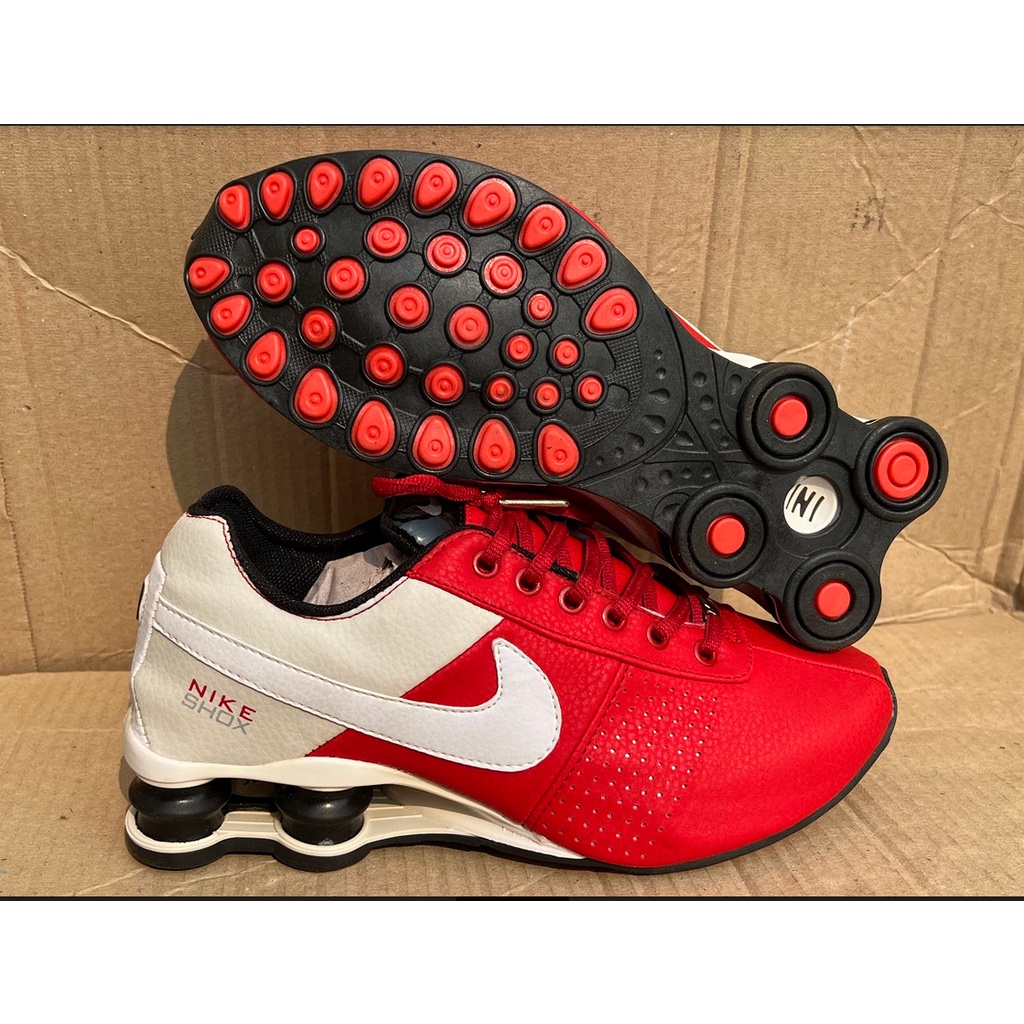 Tênis nike best sale shox vermelho