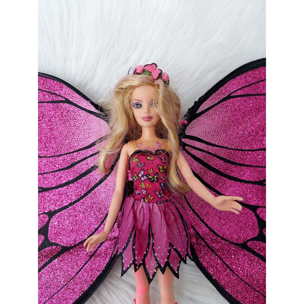 Barbie mariposa store magic wings doll