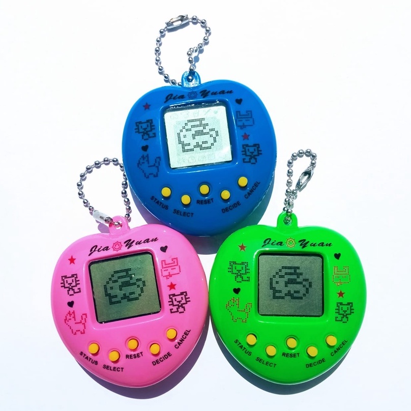 BRINQUEDO BICHINHO VIRTUAL / TAMAGOTCHI COM CORDINHA - XH9820