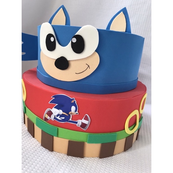 Artes de Monizinha - Bolo Fake Sonic 💙 . Hoje falamos de jogos