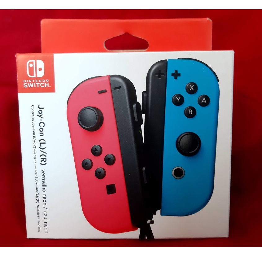 Nintendo Switch Conjunto Comandos Joy-Con Azul Néon & Vermelho