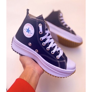 Converse platform outlet bianche indossate