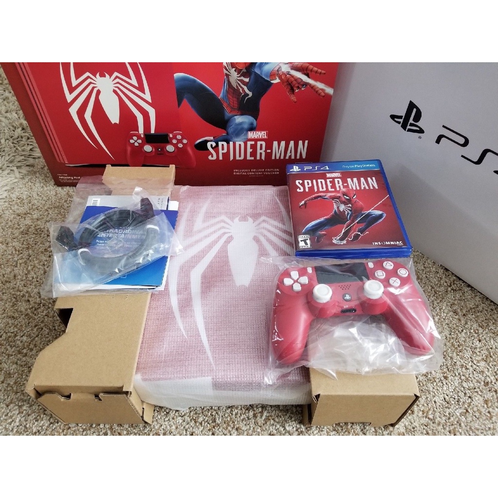 PlayStation 4 Pro Console - Limited Edition Amazing Red Marvel's