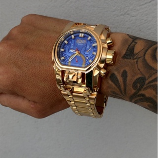 Relógio Magnum Analógico Masculino Dourado Pulseira de Couro Marrom  MA32952P