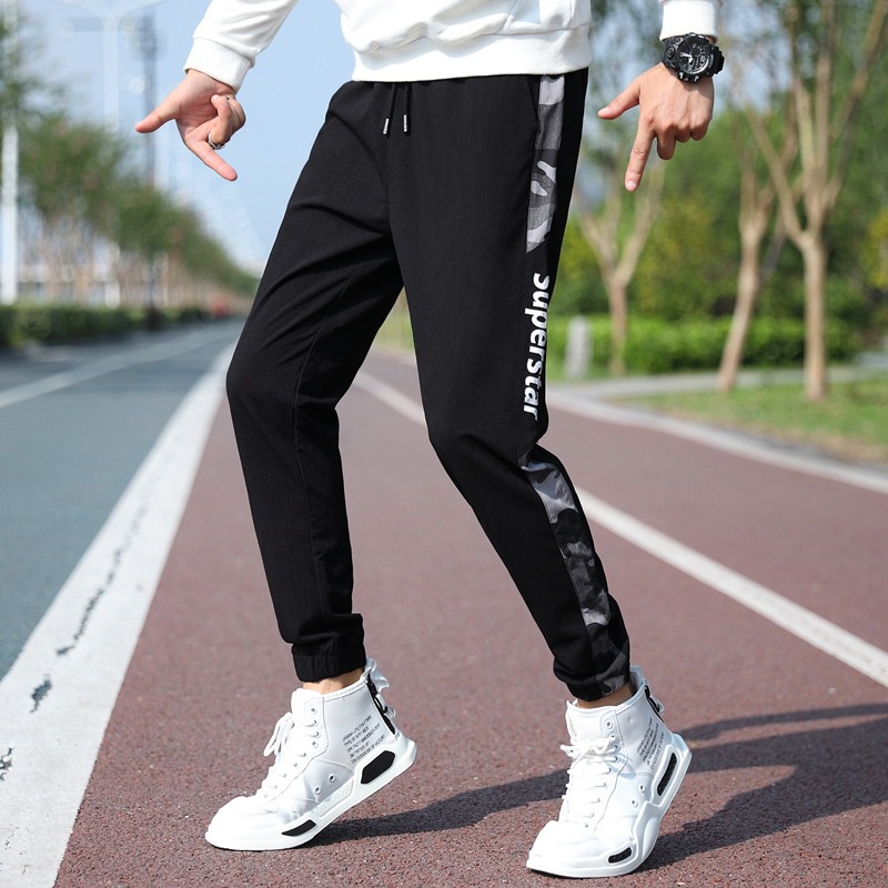 Preços baixos em Calça Track Nike Masculino Branco Activewear Calças para  Homens