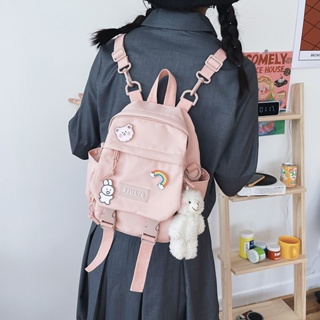 Novo modelo de mochila de ombro duplo de Xiulong, crachá de desenho animado fofo para alunos do ensino fundamental e médio, bolsa de ombro único, bolsa escolar feminina fresca