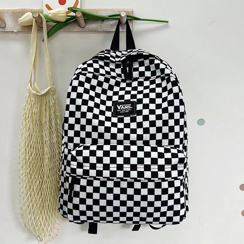 Mochilas escolares vans 2024 off the wall