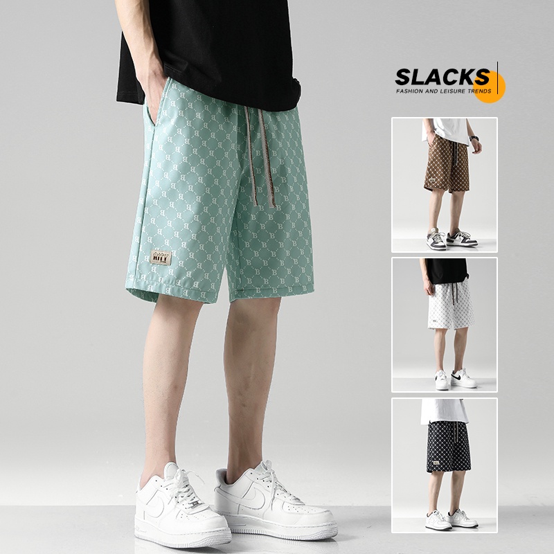 Shorts pretos com estampa de letras de tubo reto de tendência casual de verão