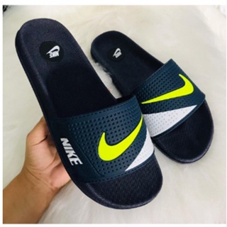 Black and best sale green nike slides