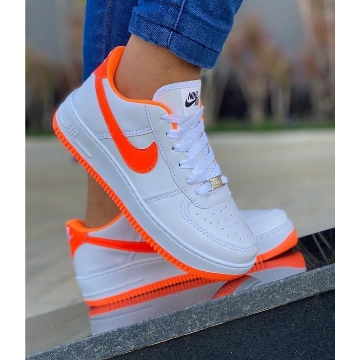 Tenis nike laranja fluorescente hot sale feminino