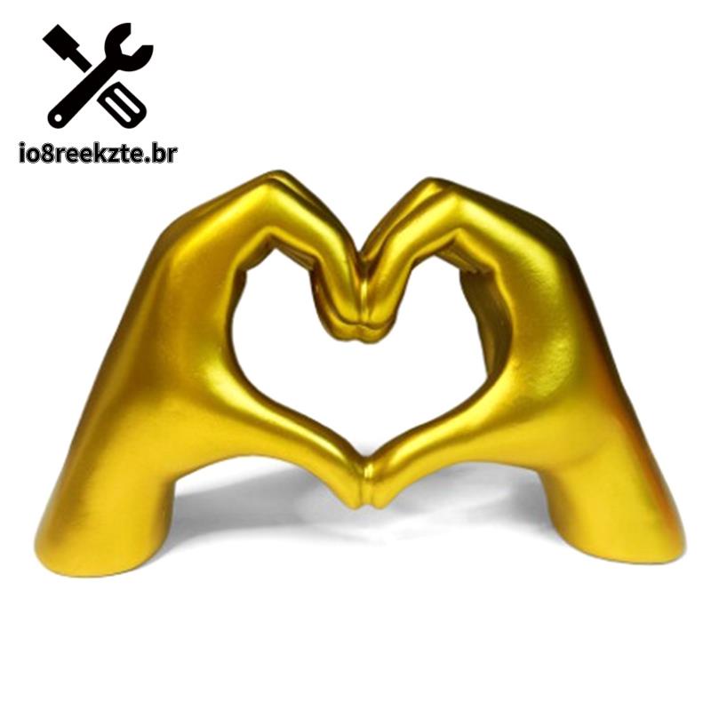 Gold Heart Hands Sculpture