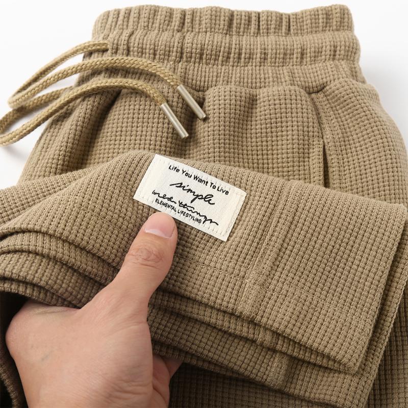 Waffle Khaki Calção pesado Homens Mulheres Summer Plus Tamanho 150kg Calça Casual americana solta de cinco pontos