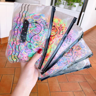 KIT 500/1000/1500 Peças Elásticos Faixas de Cabelo Com Bolsa Contendo Ligas de Silicone - WL em Oferta na Shopee