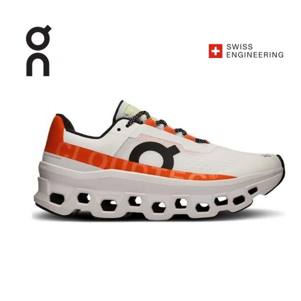 Em sapatos de corrida com amortecedores de choque respiráveis Cloudmonster