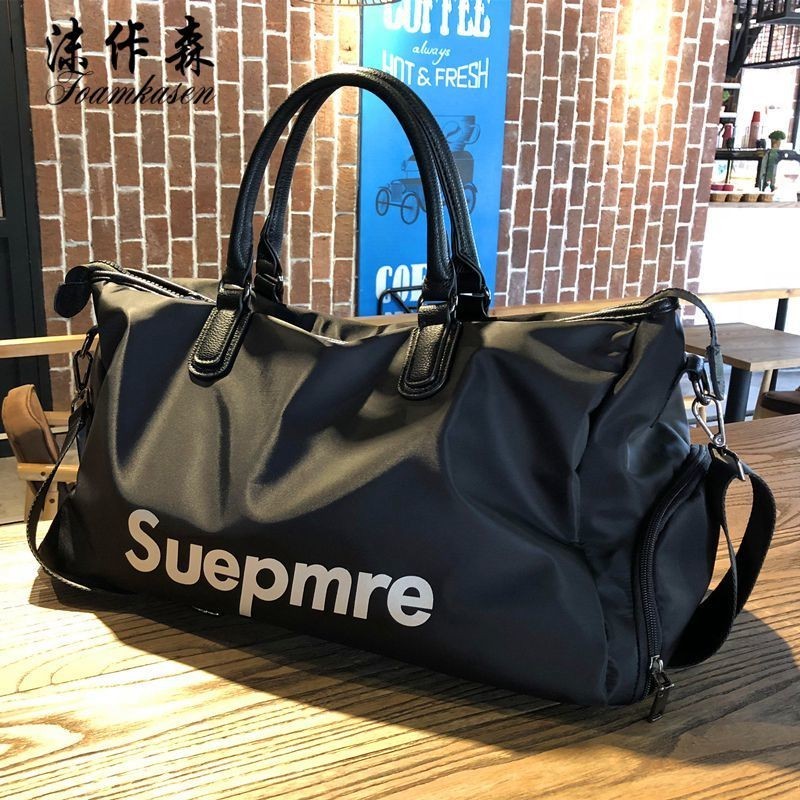 Bolsa de viagem Influenciadora Bolsa de viagem feminina portátil coreana Versão curta distância Pequena luz Viagem de negócios masculina Viagem de negócios de grande capacidade Separação a seco úmido Lug