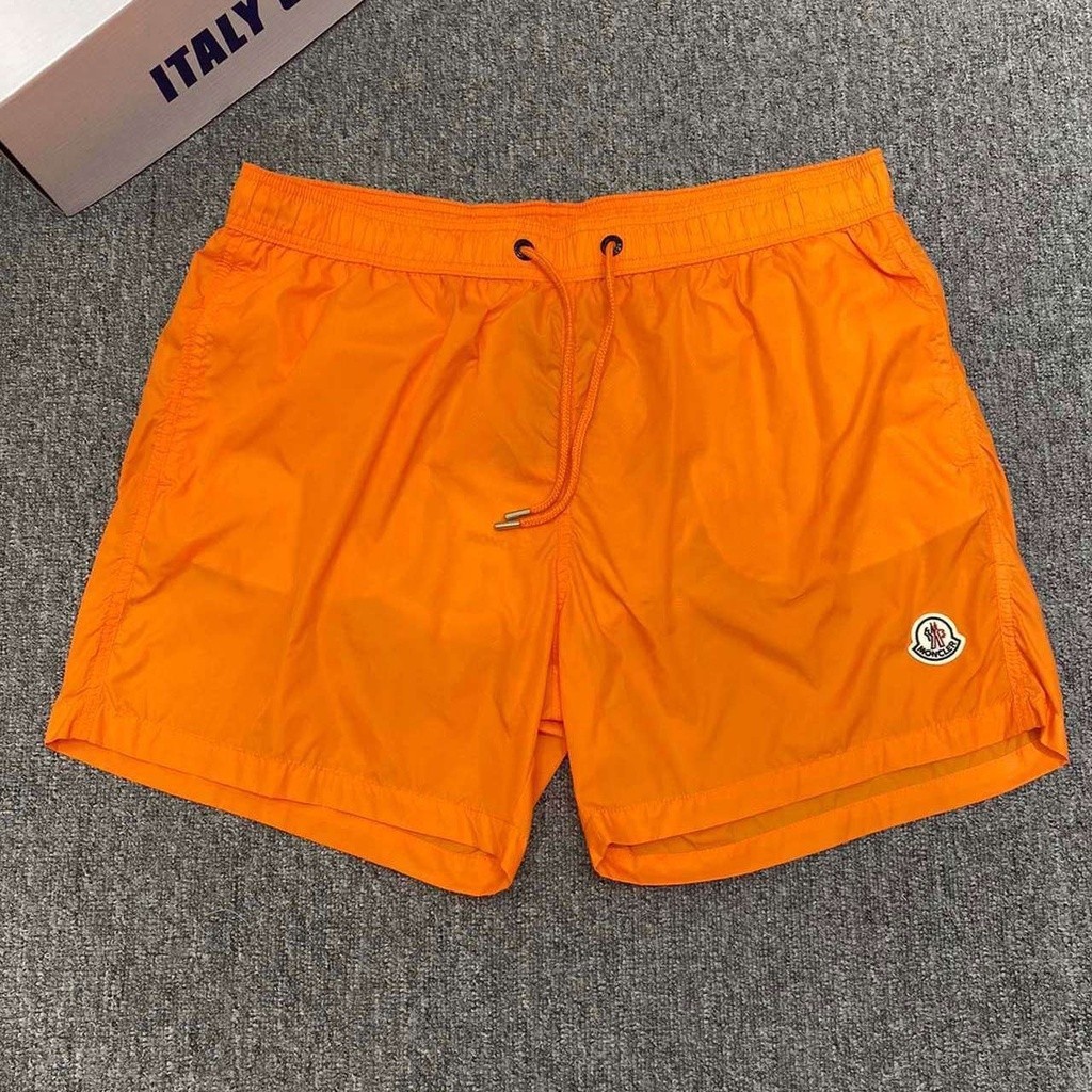 MQ2U marca de moda clássica para homens e mulheres shorts casuais