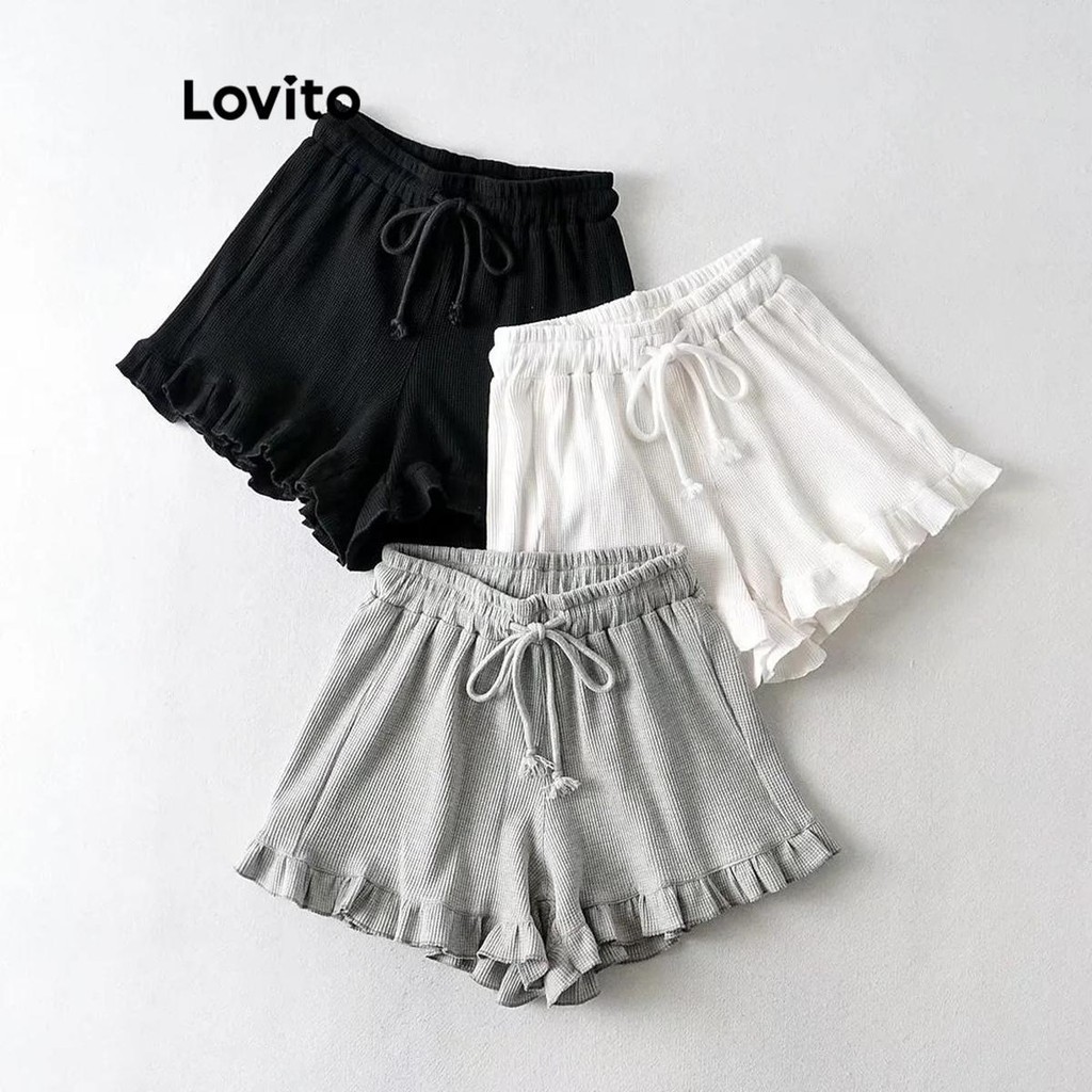Lovito Shorts esportivos esportivos com babados lisos para mulheres LNL60102