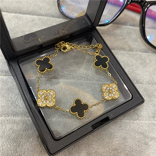 Aço de titânio de dupla face, trevo de quatro folhas, pulseira de pulseira de panda preto e branco para homens e mulheres, luxo leve, alta qualidade, acessórios de joalheria de cinco flores