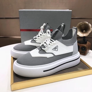 Venda quente/Prada/Respirável Fly Malha Top Gota Cola Processo Calçado Esportivo Emenda Homens/Não-slip Casual Sneakers Correndo Luz