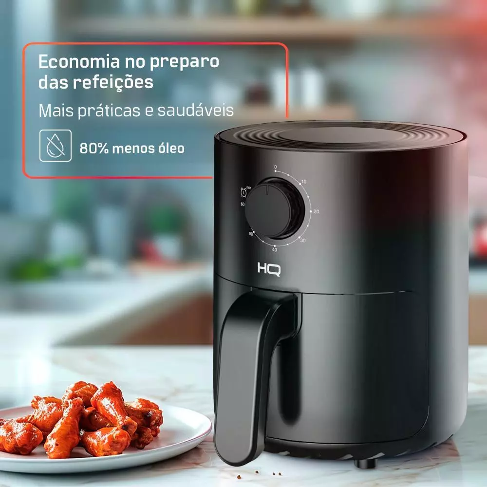 Fritadeira AirFryer HQ ao lado de prato com pedaços de frango frito