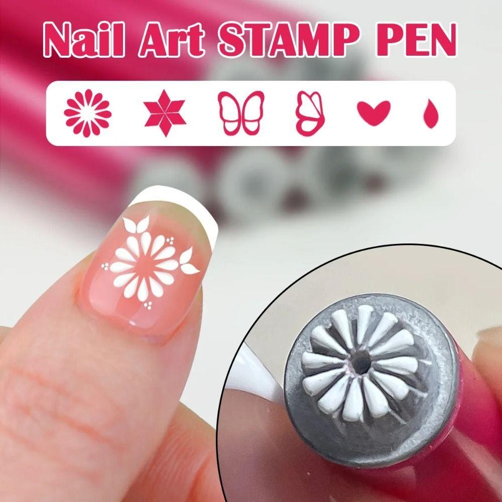 Detailed close-up of silicone floral nail stamp head and finished daisy nail pattern